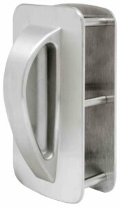 Image of the DH445 5-Point Ligature Resistant Back-to-Back Push/Pull Dummy Handle mounted on a door. The handle has a ligature-resistant design, featuring five secure attachment points to reduce tampering risks, making it ideal for behavioral health settings. The handle has a clean, minimalist look, with a smooth finish and rounded edges to prevent potential self-harm while providing functionality and durability for high-use environments.